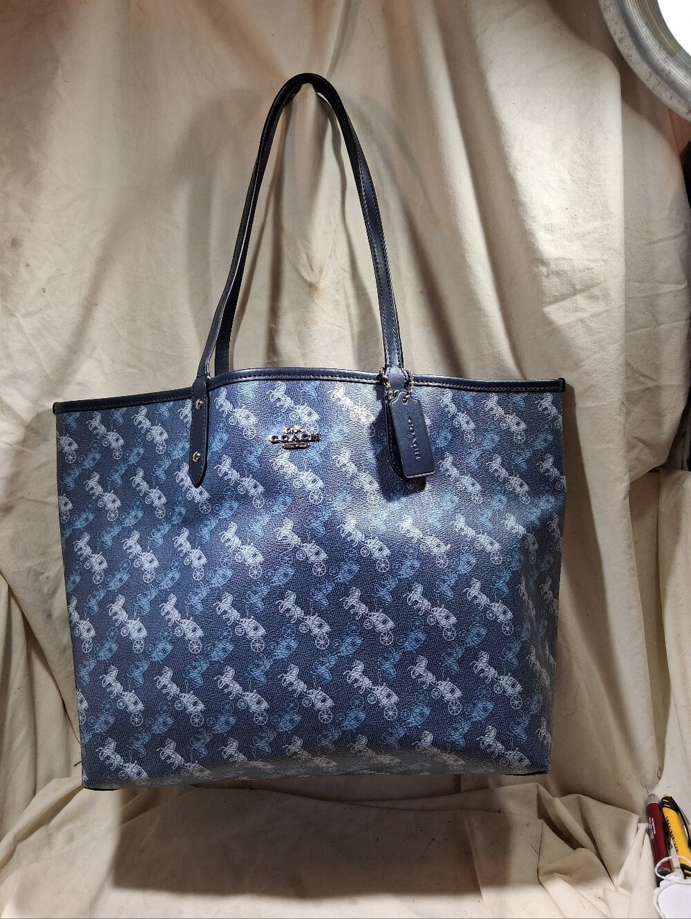 Coach reversible city tote with horse and carriage print